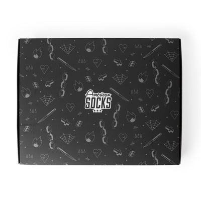Black giftbox with grey small illustrations of knifes spider webs hearts and crosses by american socks