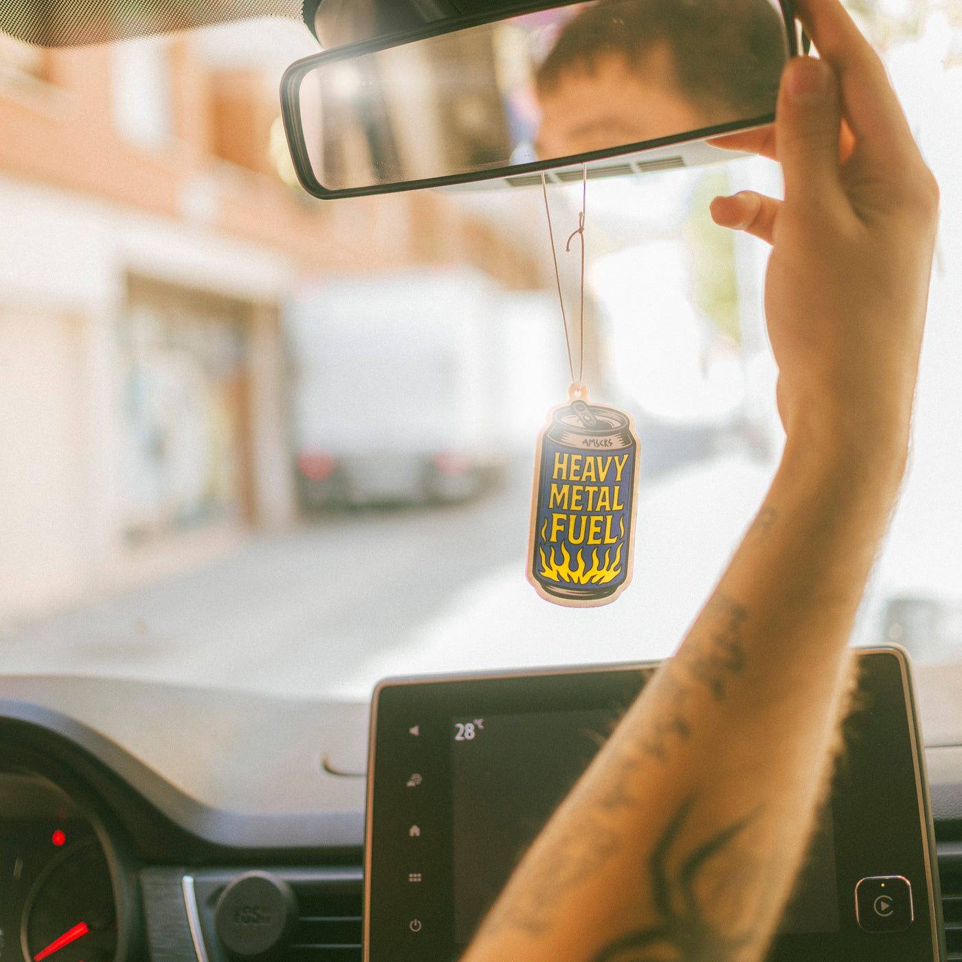 Air freshener beer can with 'Heavy Metal Fuel' text american socks